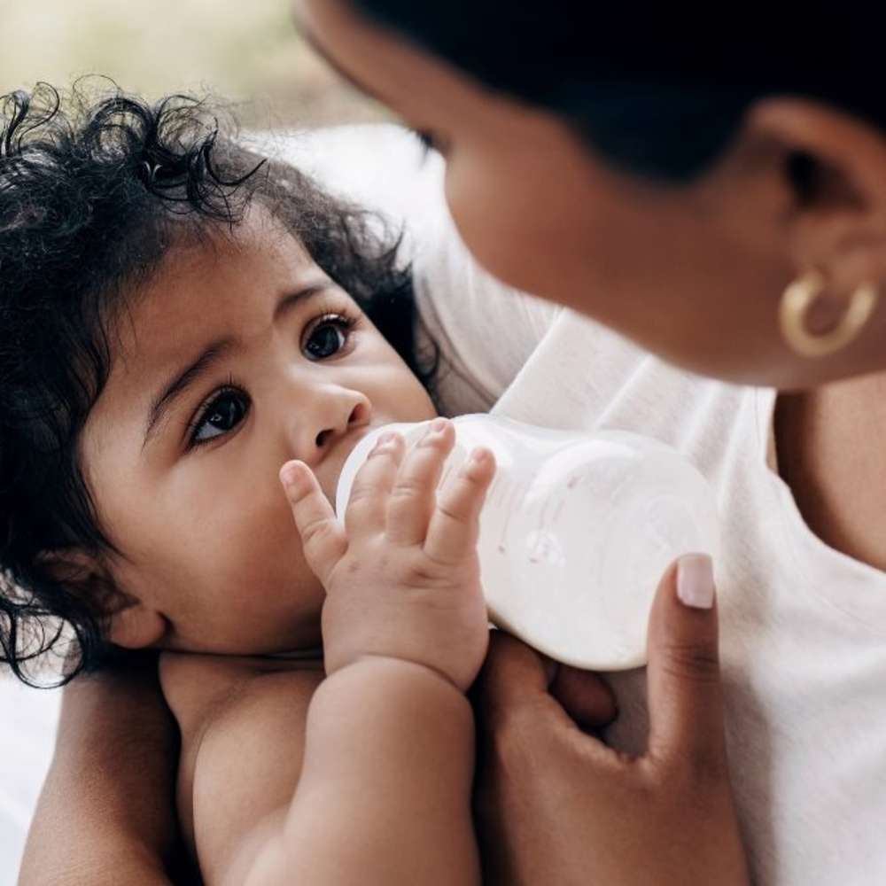 child being formula fed