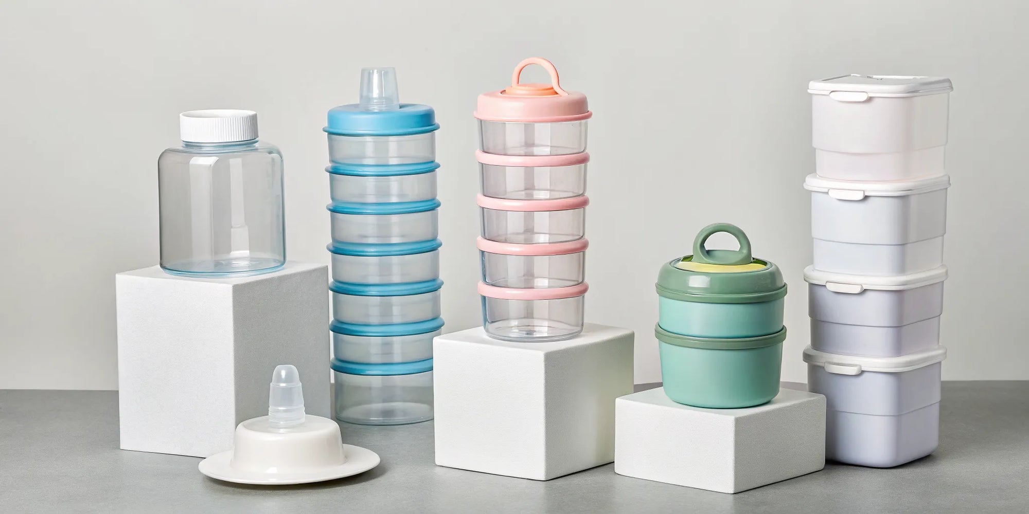 A variety of baby formula containers for easy feeding at home and on the go.