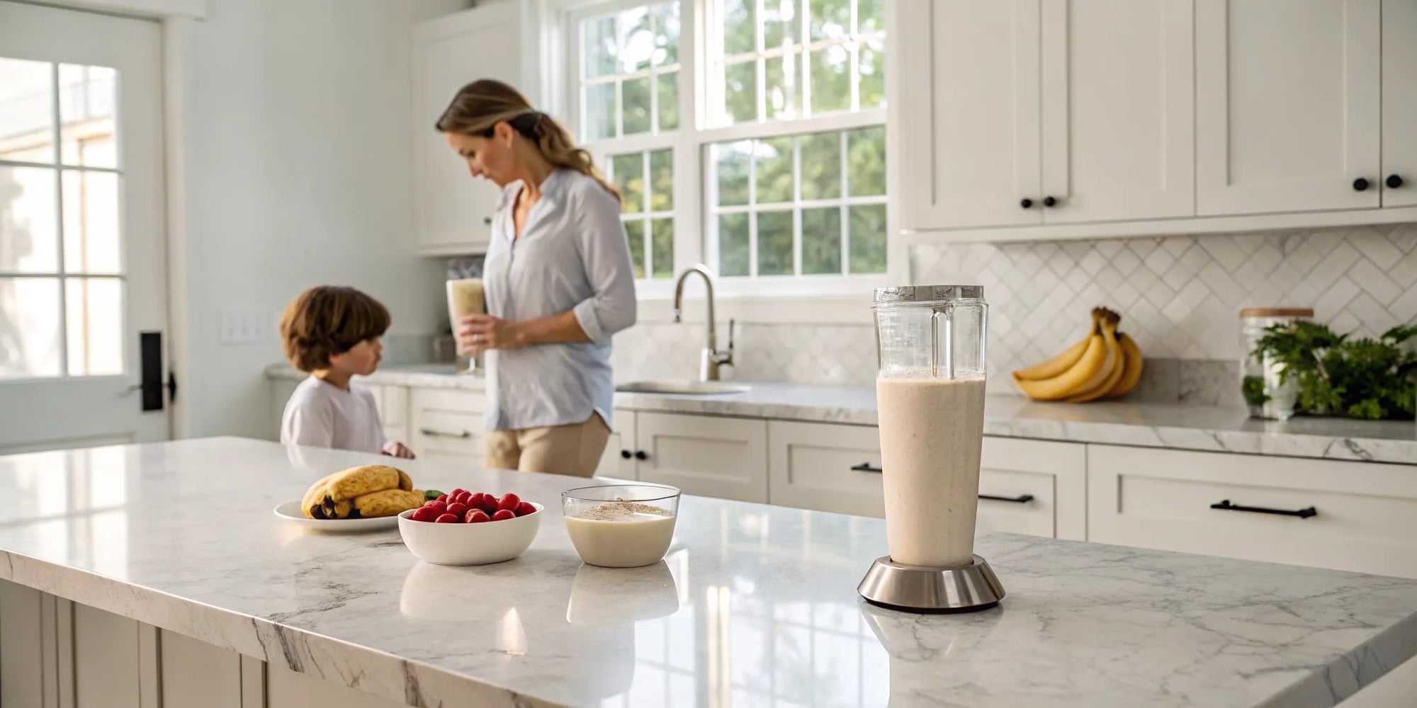Mother and child preparing a healthy protein shake for kids with bananas and berries in the kitchen.