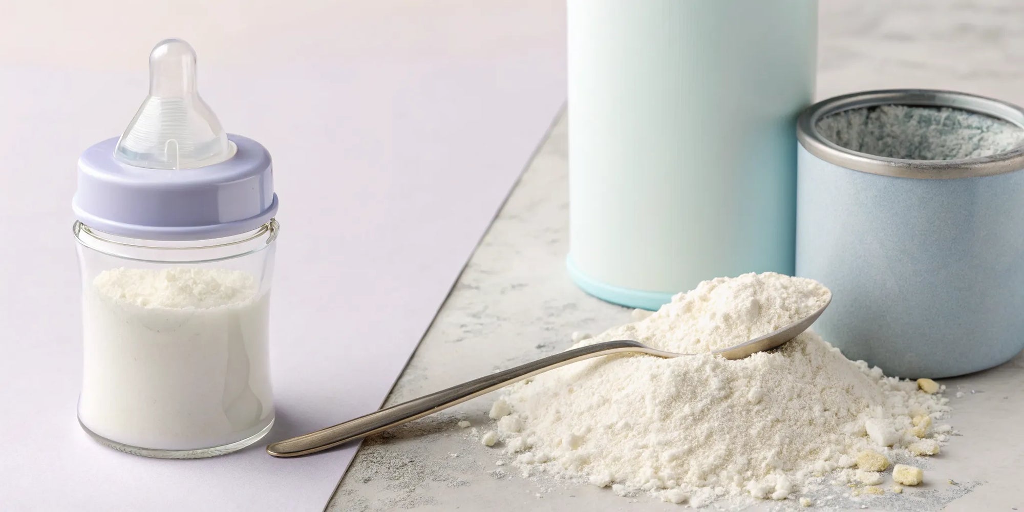 A can of baby formula powder and a bottle for choosing between sensitive vs gentle formula.