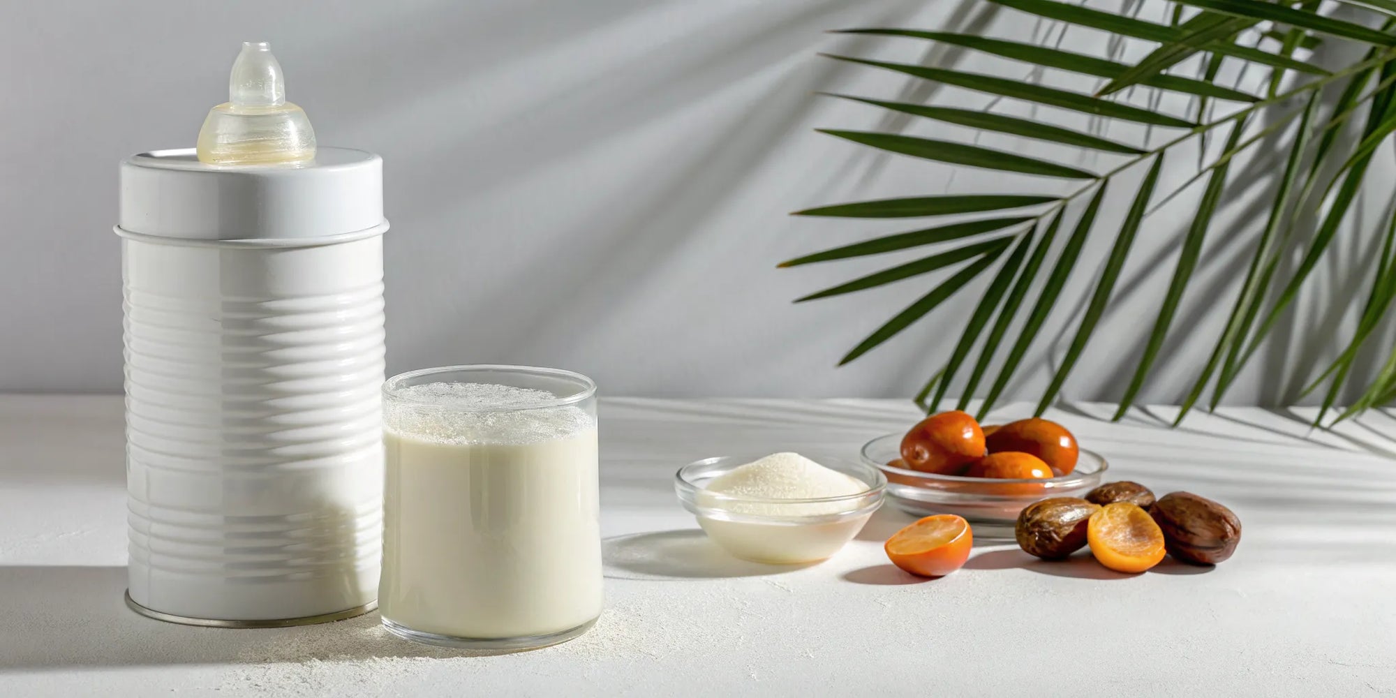 A scoop of baby formula powder next to palm oil fruits, an ingredient to avoid.